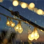 Kép 6/10 - 4,9 m-es dekor gömb kerti LED fényfüzér átlátszó vezetékes, 50 db meleg fehér LED, IP44, hálózati adapterrel