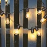 Kép 8/8 - 20 m-es 20 LED izzó E27 fényfüzér, hybrid tölthető-napelemes, meleg fehér, 8 féle fényjátékkal, időzíthető, távvezérlős, IP44