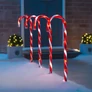 Kép 2/7 - 4 db-os XXL méretű "candy cane" világító cukorka sétapálca lámpa szett, elemes, 32 LED, 74 cm