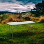 Kép 5/5 - Nagyméretű masszív Vendéglátó asztal lehajtható lábakkal és fogantyúval, 180 x 75 cm 