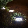 Kép 4/6 - 12 db napelemes lámpa a kertbe földbe szúrható kerek 12 cm-es átmérő 8 LED/lámpa